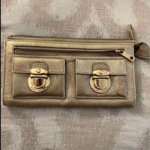 Marc by Marc Jacobs gold wallet. Slight interior staining as pictured